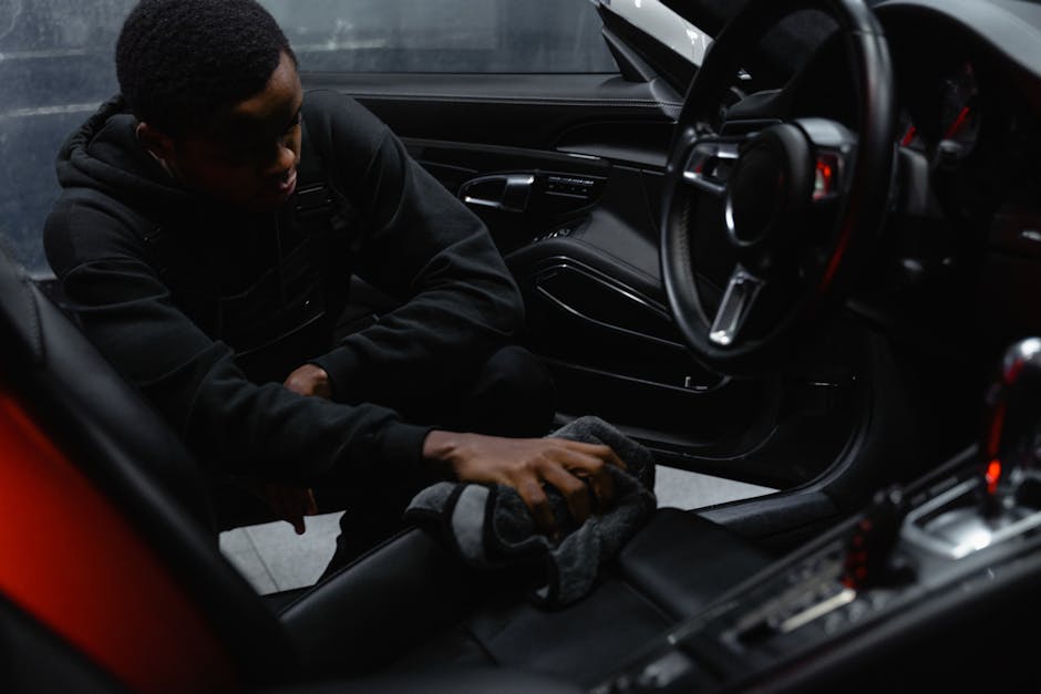 Detailed cleaning of a car interior dashboard